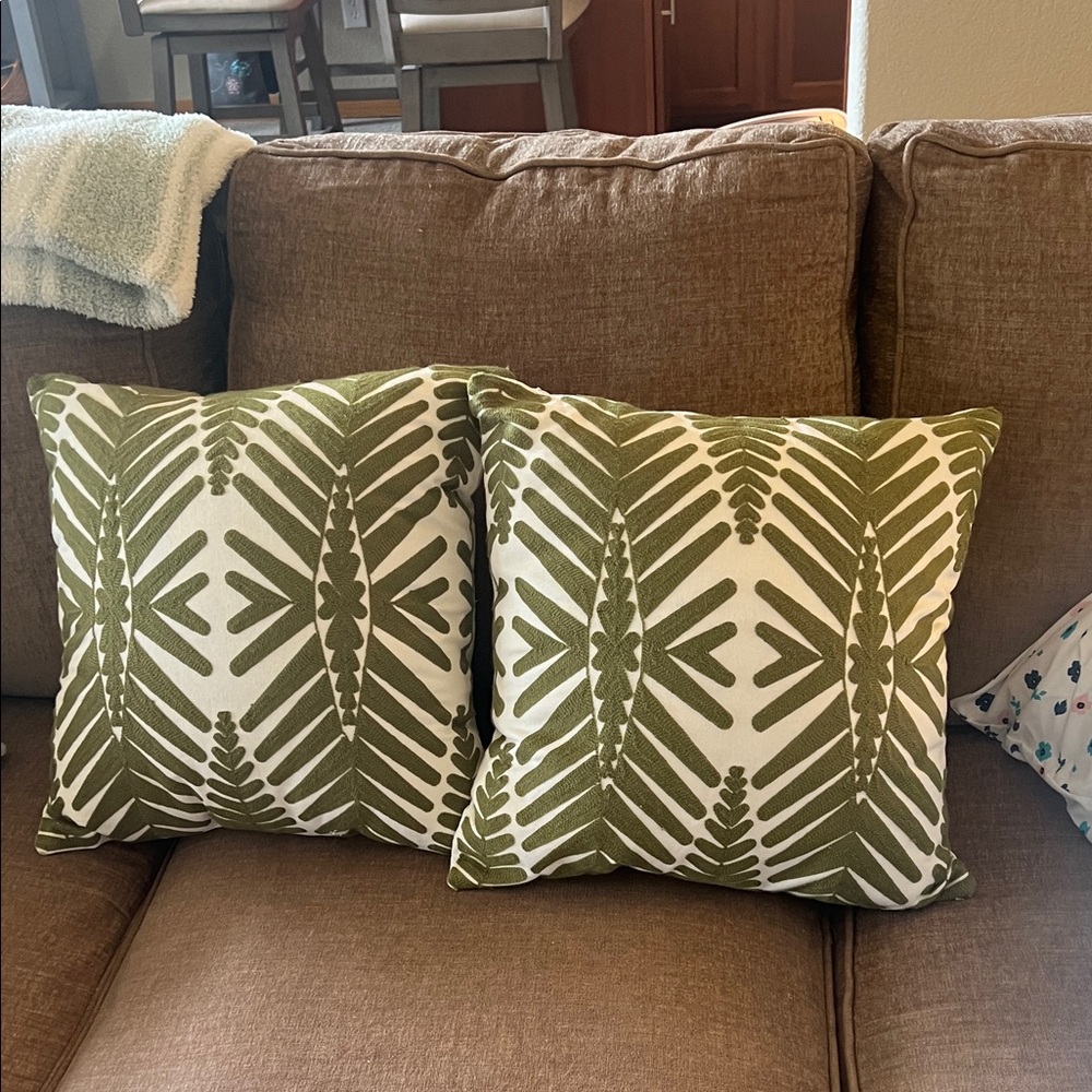 Green and White Patterned Throw Pillows